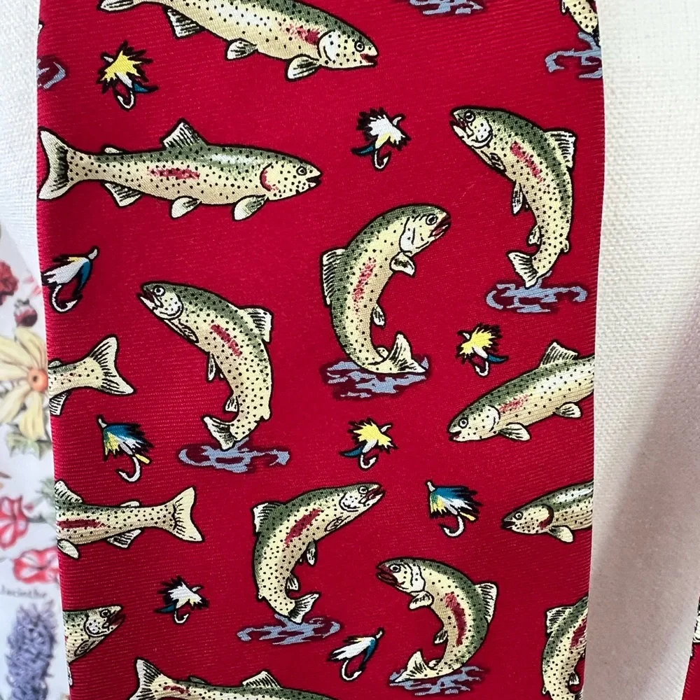 Rainbow trout neck tie by Alynn Neckwear. It is red with rainbow trout.